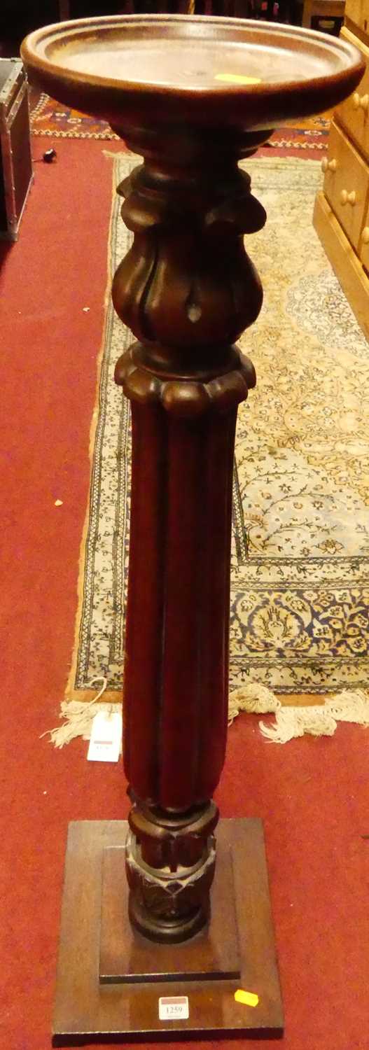A carved mahogany plant stand, h.94.5cm