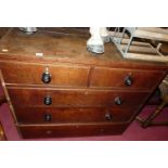 A 19th century oak chest of two short over three long drawers (lacking supports and two lower