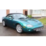 A 1998 Jaguar 4 litre XK8 convertible automatic coupe Reg No. S289 BWC Chassis No. SAJJGKFD3AR002021