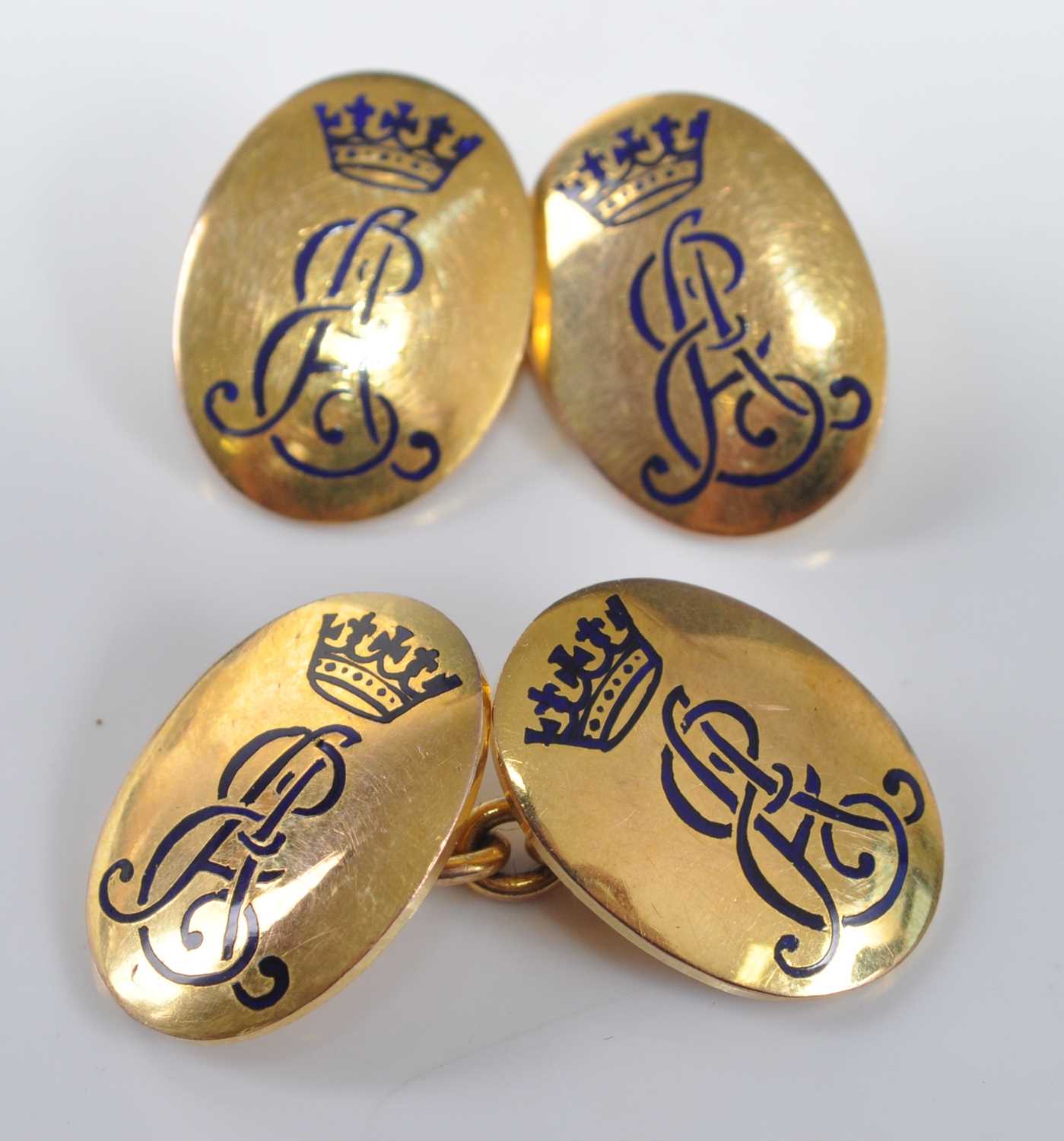 A pair of gilt metal double-ended cufflinks, each with two 19 x 14mm oval plates engraved with Royal
