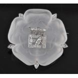 A white metal carved rock crystal Tudor Rose brooch, with the initials EA surmounted by a crown in