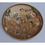 A Japanese Taisho period Satsuma earthenware bowl, highly decorated in gilt with multiple Rakan