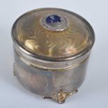 A St James House Company silver and silver-gilt cylindrical music box, 7.7oz, dia.7cm, in fitted