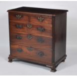 A George III mahogany chest, the top having a thumb moulded edge above two short and three long