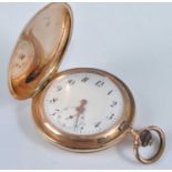 A continental 14ct gold cased gent's full hunter pocket watch, having engine turned covers, unsigned