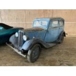A circa 1938 Morris 8 series II two-door saloon in blue Registration FNO 904. In barn-find condition