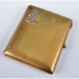 A yellow metal rectangular cigarette case, having a royal monogram in the corner set with thirty-