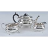 A mid-20th century three-piece silver tea service, comprising teapot, sugar and cream, each piece of