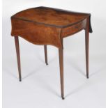 A George III mahogany and rosewood crossbanded Pembroke table, of serpentine outline, having