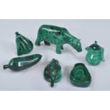 A collection of polished malachite carvings, to include polar bear (h.18cm), sweetcorn cob, single