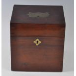 A circa 1830 mahogany decanter box, having flush brass carry handle and hinged cover, opening to