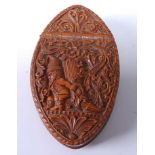 A late 19th century Norweigan treen souvenir snuff box, of elongated oval form, intricately carved