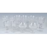 A suite of Cumbia crystal Grasmere pattern drinking glasses, comprising seven wine hocks, two brandy