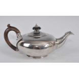 A William IV silver bachelors teapot, of plain squat circular form on stepped footrim, with