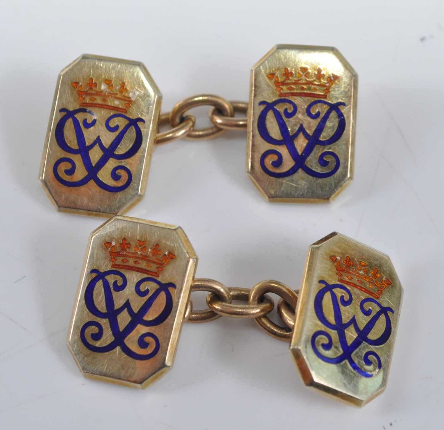 A pair of 9ct yellow gold double-ended cufflinks, each featuring a 15 x 10mm octagonal plate