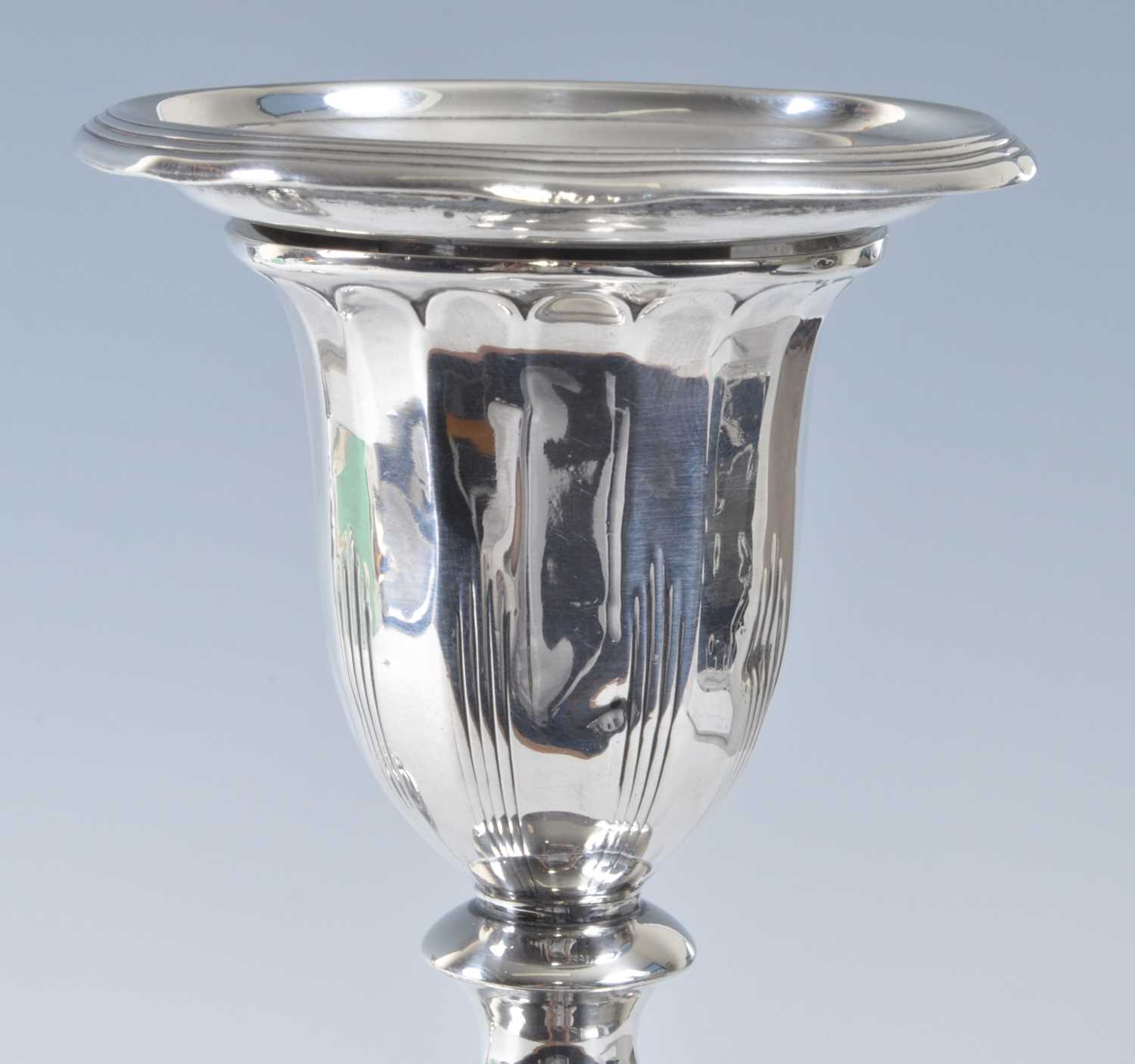 A pair of George III silver loaded candlesticks in the neo-classical taste, having chased reeded and - Bild 5 aus 6