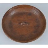 Robert 'Mouseman' Thompson - a carved oak circular table bowl, of shallow form, with typical adzed