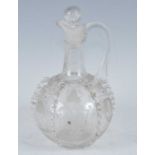 A circa 1790 Dutch glass carafe, the cylindrical neck with single loop handle, the lobed globular