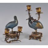 A pair of Chinese cloisonne enamel quail candelabra, each bird decorated in coloured enamels on a