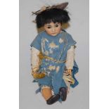 A rare Simon & Halbig Oriental bisque head doll, having rolling brown eyes and open mouth with two