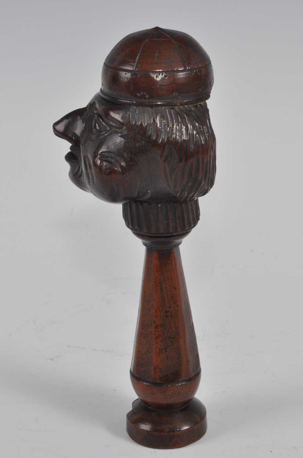A 19th century treen figurative nutcracker, the head as a smiling man wearing a cap, the tapered - Bild 3 aus 5