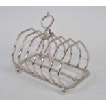 An Edwardian Scottish silver six-division toastrack, the dividers of shaped flattened hexagon