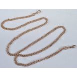 A 9ct gold curblink long watch chain, with twin fastenings, 42.6g, w.4.5mm, length 76cm