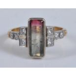 A yellow and white metal Art Deco style parti-coloured tourmaline and diamond ring, comprising a