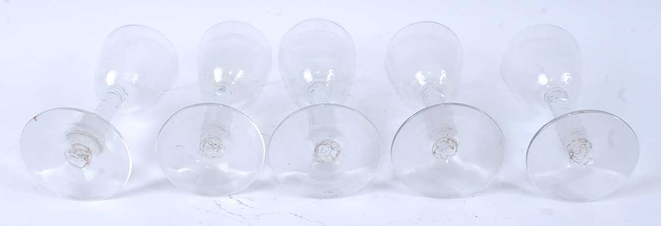 A set of five 18th century style wine glasses, each having a round funnel bowl above a mutliple - Image 4 of 4