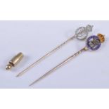 Two yellow metal royal monogram stick pins, one with oval openwork detail and letter G set with