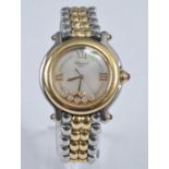 A ladies Chopard bi-metal Happy Sport wristwatch, the signed dial set with seven floating