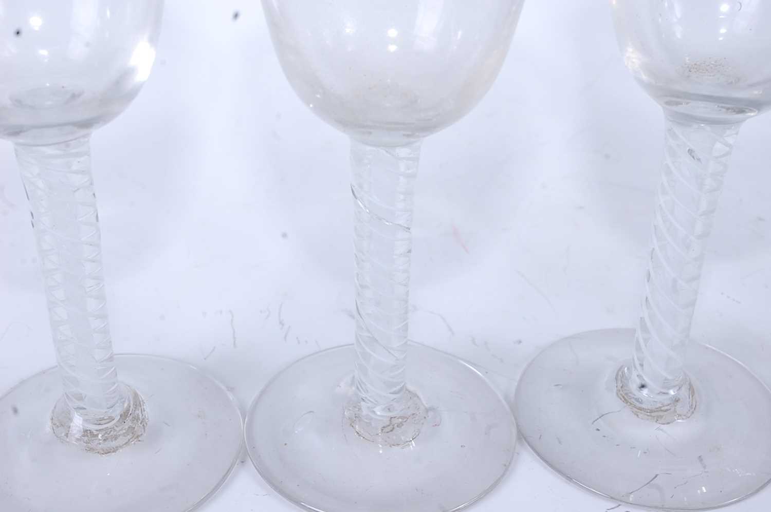 A set of five 18th century style wine glasses, each having a round funnel bowl above a mutliple - Image 2 of 4