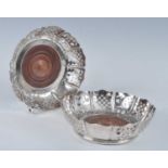 A pair of probably Victorian pierced silver-plated coasters, of deep circular form with alternate