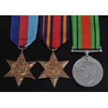 A WW II group of three medals, to include 1939-1945 Star, Burma Star and Defence, together with a