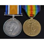 A WW I British War and Victory pair, naming 5682 PTE. S.J. COOPER. 1-LOND. R. (2)