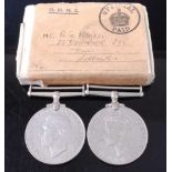 A WW II Defence and War pair in OHMS box addressed to Mr R.G. Mayes, 39 Denmark St, Diss, Norfolk,