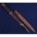 A German M1884/98 Third pattern bayonet, the 25cm single edged fullered blade marked to the