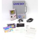 Original Nintendo Gameboy Console with carrying case, which contains two games; Tetris and Mario