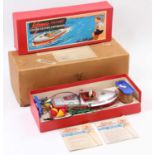 A Schuco Elektro-Delfino No. 5411 battery operated speed boat comprising of red & silver body with