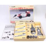 A Kyosho 1/18 scale radio controlled model kit for a Maclaren MP4/3 Tag Turbo race car, unmade