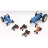 A collection of six various mixed scale Ertl Britains and Crescent agricultural diecasts to