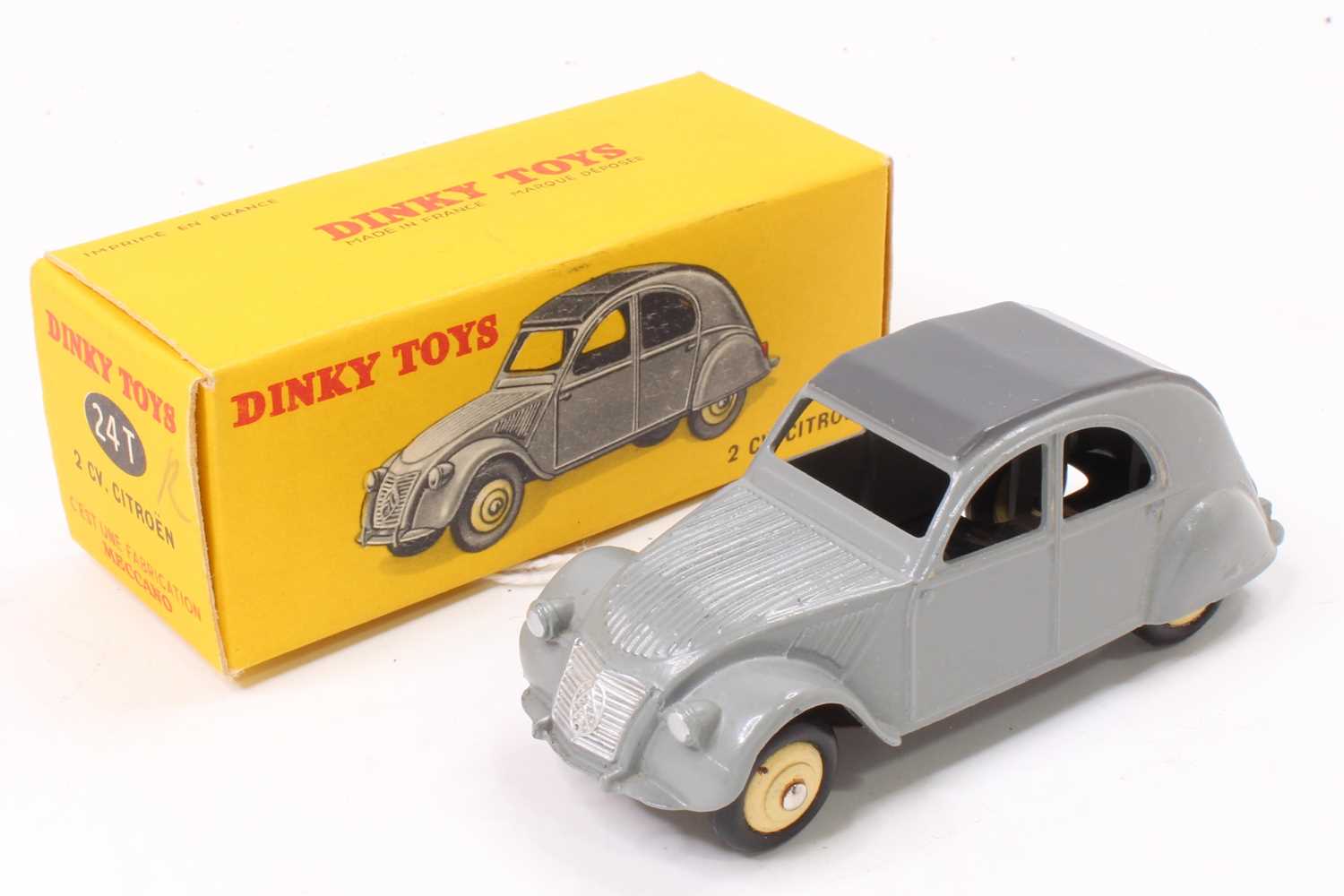 French Dinky Toys No.24T 2CV Citroen, comprising grey body with dark grey roof and cream hubs,