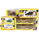 Six various boxed Caterpillar related mixed scale diecast vehicles and accessories, to include a