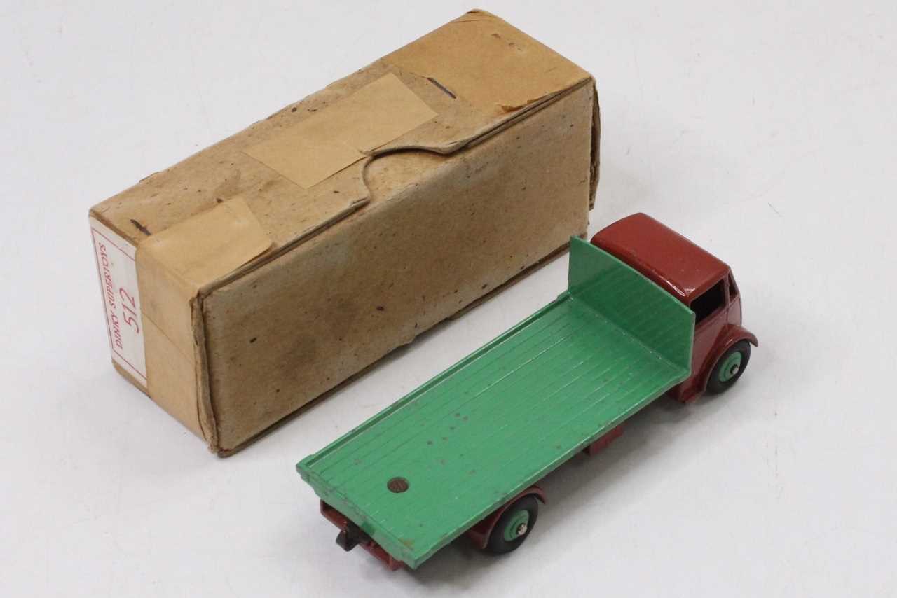 Dinky Toys, 512, Guy Flat Truck, rare example with brown cab and chassis, green hubs and back, - Image 2 of 2