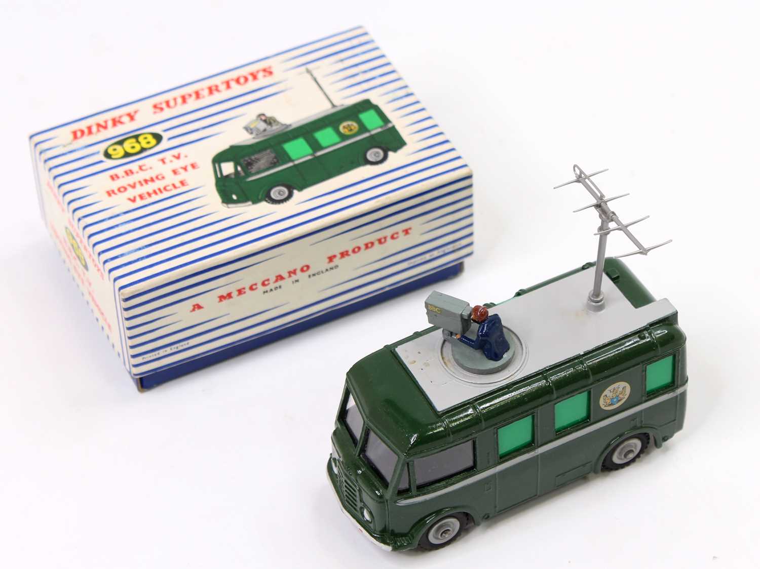 Dinky Toys No. 968 BBC TV roving eye vehicle with dark green body and grey detailing, with cameraman