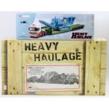 A Corgi Heavy Haulage 1/50 scale boxed road transport group, two boxed as issued examples, to
