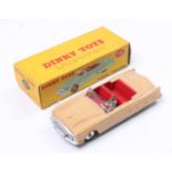 Dinky Toys 132, Packard Convertible, comprising tan body with red body, spun hubs and driver figure,