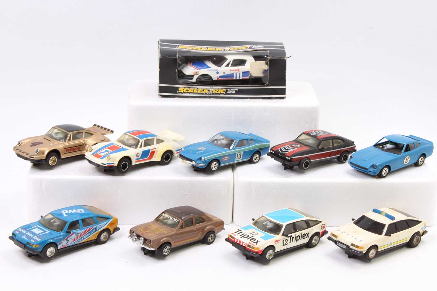 10 various Scalextric slot cars including Ford Escort, Rover 3500, Porsche Turbo, Ford Capri and