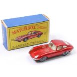 Matchbox Lesney No. 32 E Type Jaguar in metallic red with a cream interior and grey plastic tyres,