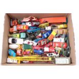 A box containing Matchbox, Corgi and Dinky Toys models in play worn condition to include, Guy